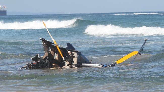 A helicopter crashed in the shallows between Ocean Grove and Point Lonsdale. Picture: Alan Barber/Geelong Advertiser/ NewsWire