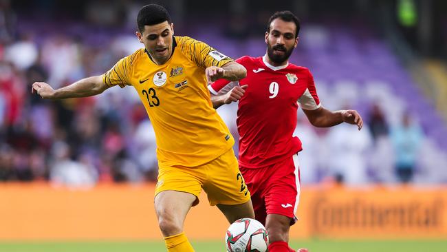 Tom Rogic broke a bone in his hand in the match against Jordan. Picture: AP 