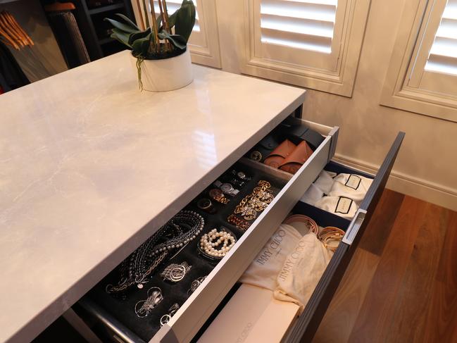 Nina's custom-built island has plenty of storage inside.