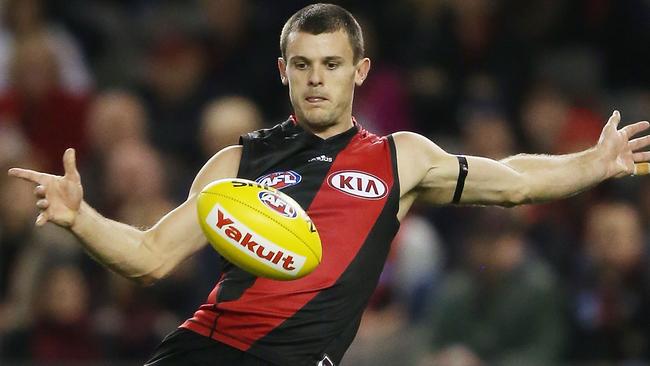 MELBOURNE, AUSTRALIA - JUNE 06: Brent Stanton of the Bombers kicks the ball for goal during the round 10 AFL match between the Essendon Bombers and the Geelong Cats at Etihad Stadium on June 6, 2015 in Melbourne, Australia. (Photo by Michael Dodge/Getty Images)