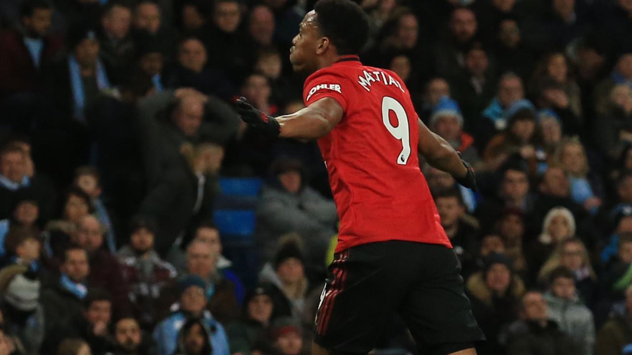 Manchester United's French striker Anthony Martial celebrates scoring their second goal during the English Premier League football match between Manchester City and Manchester United at the Etihad Stadium in Manchester, north west England, on December 7, 2019. (Photo by Lindsey Parnaby / AFP) / RESTRICTED TO EDITORIAL USE. No use with unauthorized audio, video, data, fixture lists, club/league logos or 'live' services. Online in-match use limited to 120 images. An additional 40 images may be used in extra time. No video emulation. Social media in-match use limited to 120 images. An additional 40 images may be used in extra time. No use in betting publications, games or single club/league/player publications. /