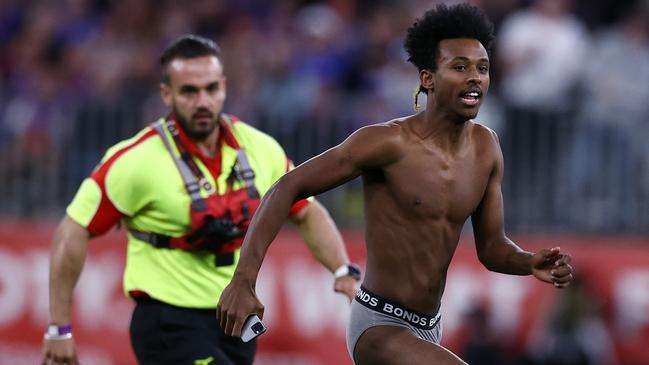 Abra Bol ran onto the field during Saturday’s AFL grand final. Picture: Michael Klein