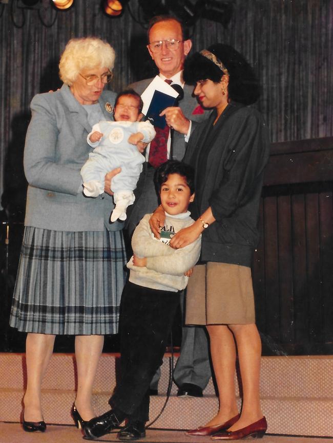 Award-winning journalist Marc Fennell (standing) unearthed this photo of himself as a boy with disgraced former pastor Frank Houston and his wife Hazel. Picture: SBS