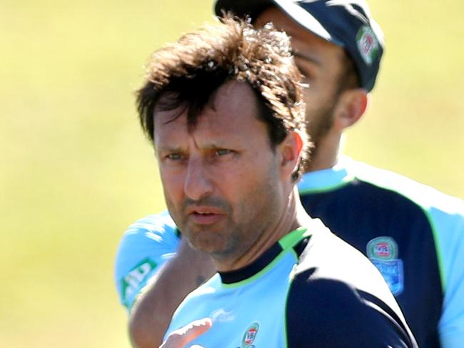 James Maloney talks to Josh Mansour as Laurie Daley looks on during warm up for the NSW Blues Origin team training session at the Novotel Pacific Bay Resort , Coffs Harbour .Picture : Gregg Porteous