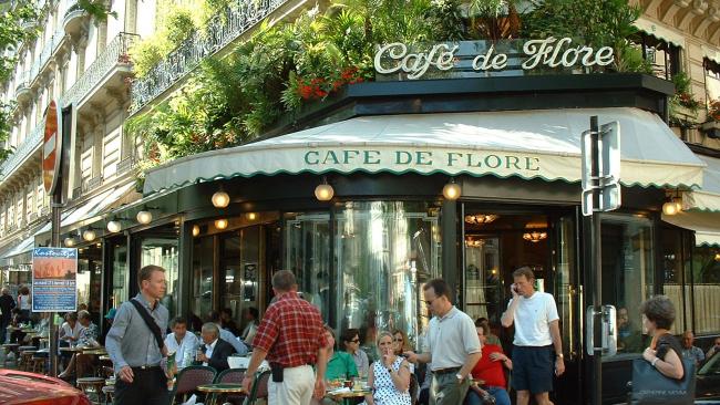 Café de Flore 
Café de Flore is a Parisian icon. Nearly as well known as the Eiffel Tower itself, Emily has the cafe’s history explained to her by her first French lover, Thomas. Located in the 6th arrondissement, this famous coffee house is celebrated for its famous clientele, which in the past included high-profile writers, artists, and philosophers. Pablo Picasso was a regular during his time in Paris, as was Eugene Ionesco.
Its main rival lives across the road, Les Deux Magots, which was once seen as the ‘cool place’ - until it became too cool and the intellectual greats migrated to Café de Flore. Now, it remains a popular people-watching spot and is often frequented by celebs.