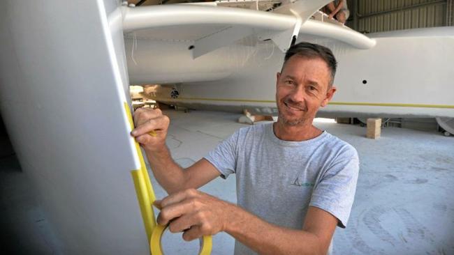 Work on Dreamworld co-founder and Bathurst 1000 winner Tony Longhurst's epic new boat. Boat builder Julian Griffiths, owner of Noosa Marine. Photo: Patrick Woods