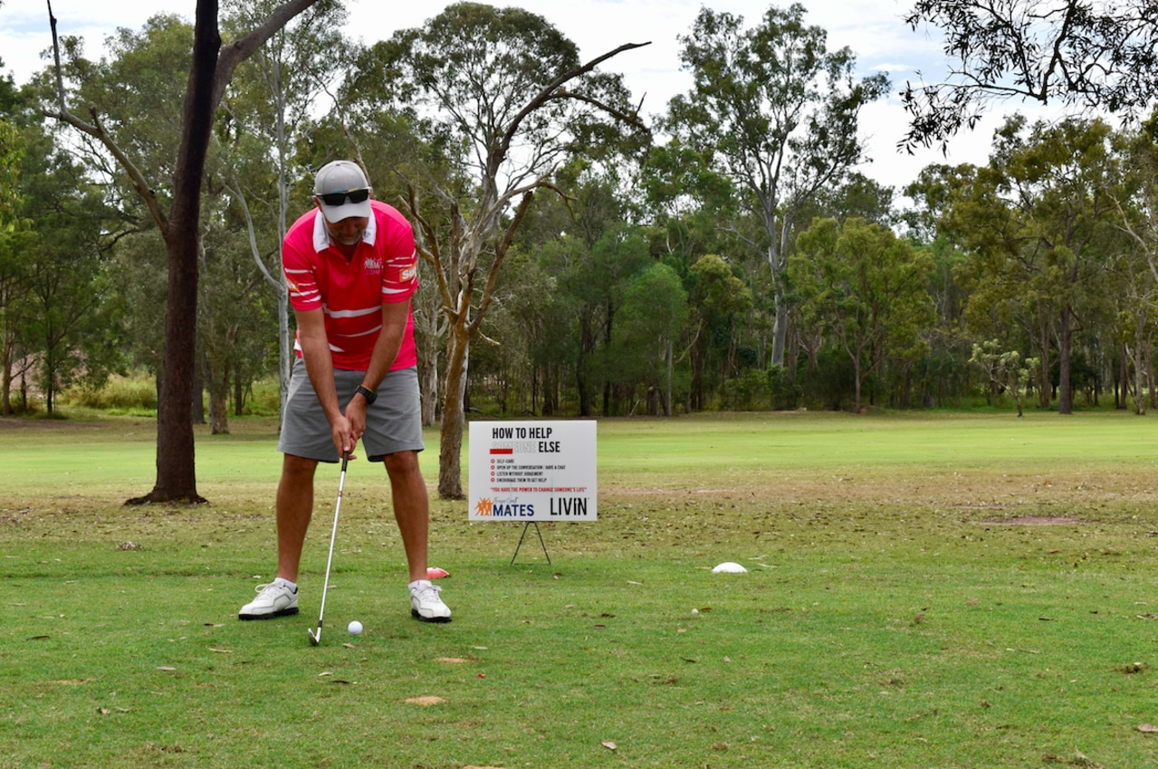 Fraser Coast Mates Day 2021, featuring a sign telling participants how to help someone else in need. Picture: Isabella Magee