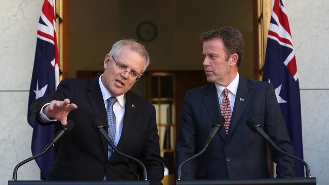 PM Scott Morrison and Minister for Education Dan Tehan spruik the deal at a press conference at Parliament House in Canberra. Picture: Kym Smith