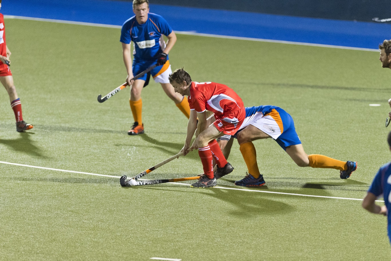 Craig Smith (left) of Red Lion is tackled by Matt Siebhur of Newtown in Toowoomba Hockey COVID Cup men round four at Clyde Park, Friday, July 31, 2020. Picture: Kevin Farmer