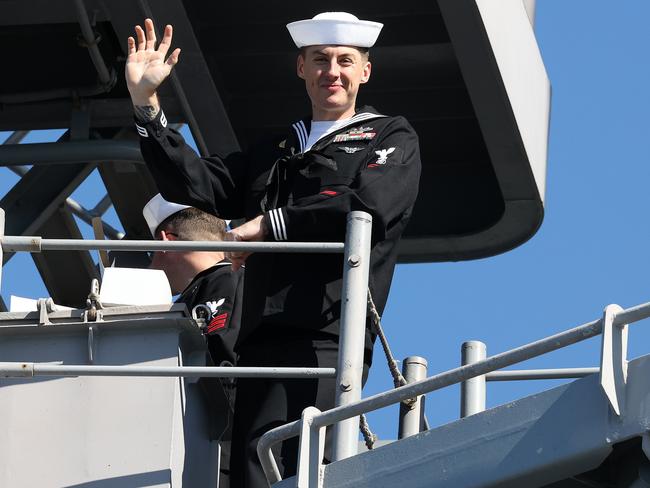 A sailor on board the USS America arrives as it arrives Brisbane on Tuesday. Picture: Liam Kidston