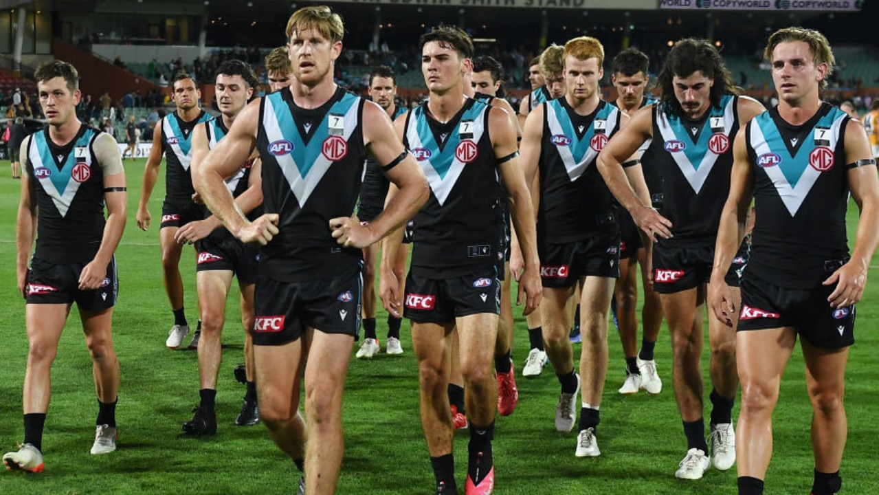 ADELAIDE, AUSTRALIA - MARCH 26: Tom Jonas of Port Adelaide leads his team off after their massive loss during the round two AFL match between the Port Adelaide Power and the Hawthorn Hawks at Adelaide Oval on March 26, 2022 in Adelaide, Australia. (Photo by Mark Brake/Getty Images)