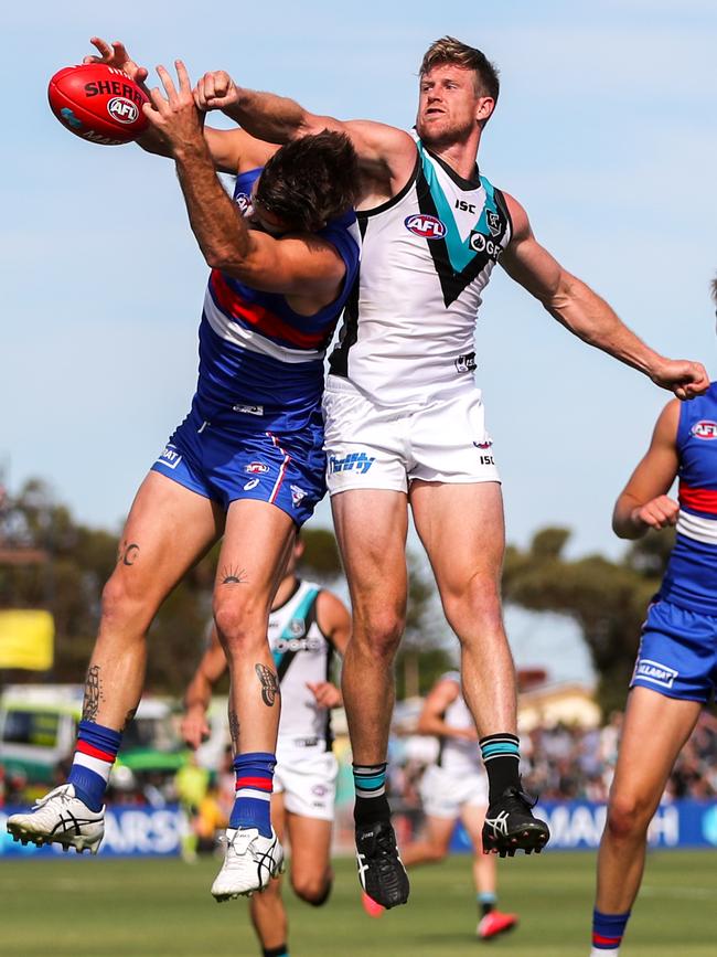 Port Adelaide captain Tom Jonas spoils the marking attempt by the Western Bulldogs’ Josh Bruce in this year’s pre-season game in Whyalla. Picture: Matt Turner