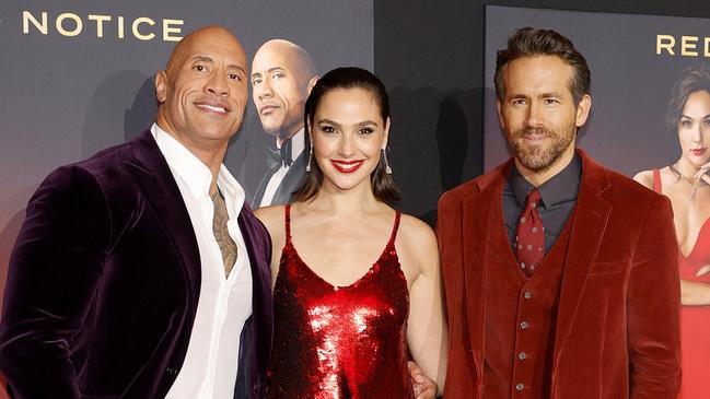 Red Notice stars Dwayne Johnson, Gal Gadot and Ryan Reynolds at the film’s world premiere in 2021. Picture: Getty