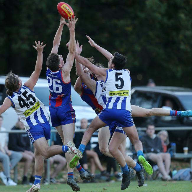 Beechworth’s Liam Stephens hauls in a strong mark against Yackandandah.