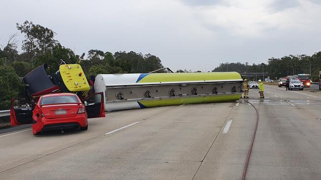 The fuel truck on its side on the M1 at Helensvale. Photo: Queensland Police