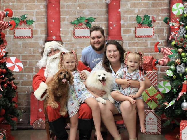 Luke, Ashleigh, Esmerelda and Rosalie Peters and their dogs Hope and Akio with Santa: PetBarn 2023 - Fraser Coast. Sent in by Ashleigh Peters.