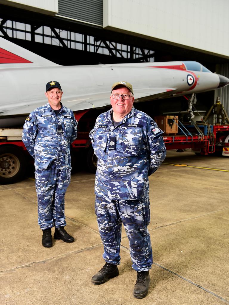 Two restored Royal Australian Air Force aircraft veterans- a Mirage fighter jet A3-55 and a Winjeel Trainer??? A85-403 - arrived at Townsville RAAF Base. WGCDR Mat Green and WO Mike Downs. Picture: Alix Sweeney