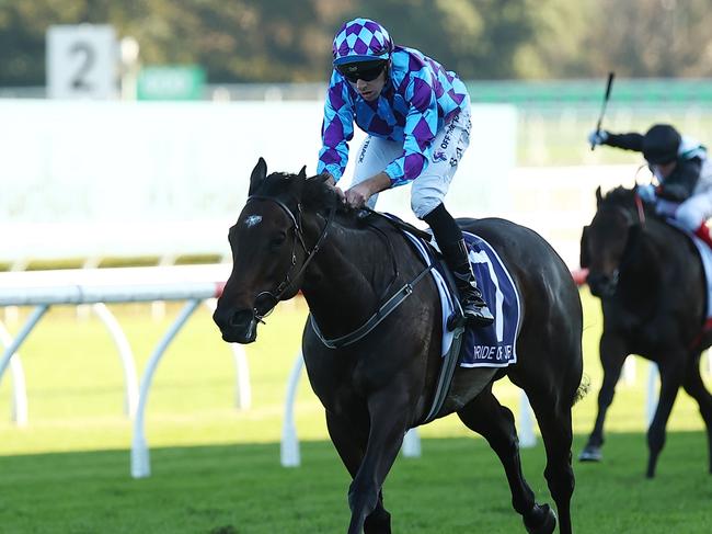 SYDNEY, AUSTRALIA - APRIL 13: Declan Bates riding Pride of Jenni wins Race 8 Queen Elizabeth Stakes during Sydney Racing: The Championships at Royal Randwick Racecourse on April 13, 2024 in Sydney, Australia. (Photo by Jeremy Ng/Getty Images)