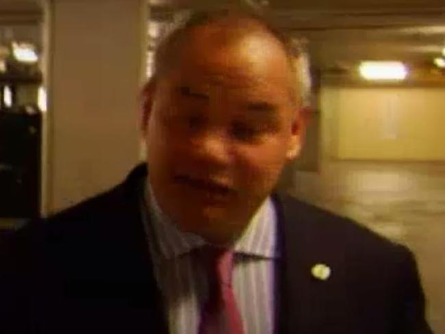 Gold Coast Mayor Tom Tate is approached by a Four Corners crew after repeatedly refusing an interview. Picture: ABC/Four Corners