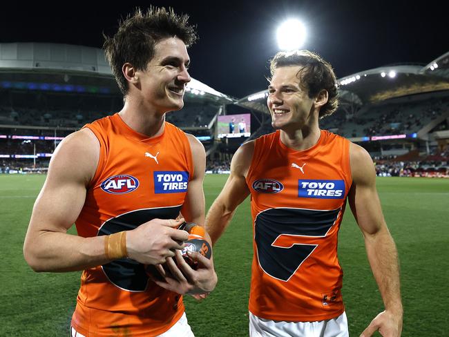 Sam Taylor and Jack Buckley celebrate the Giants win during the AFL Semi Final match between Port Adelaide and the GWS Giants at Adelaide Oval on September 16, 2023. Photo by Phil Hillyard(Image Supplied for Editorial Use only - **NO ON SALES** - Â©Phil Hillyard )