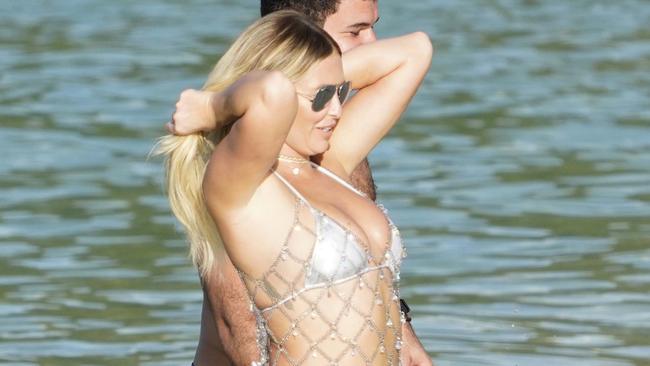 Paulina Gretzky and Dustin Johnson stand out in the St. Barts crowd.