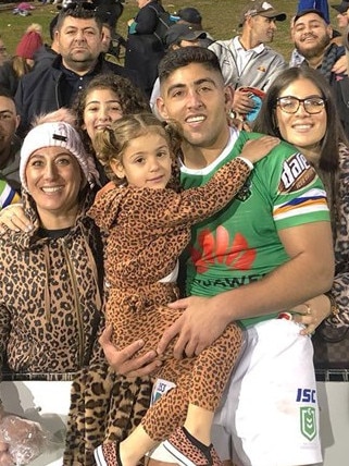 Emre Guler pictured with his family. Image: NRL