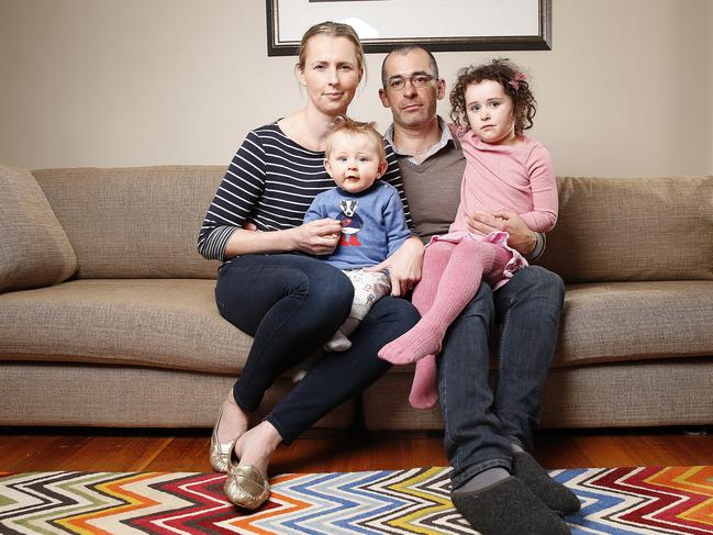 Louise and Jonathan Elliot, of West Hobart, with children Thomas, 9 months, and Esther, 4. Picture: ZAK SIMMONDS