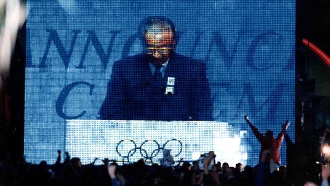 IOC President Juan Antonio Samaranch announcing Sydney's successful Olympic bid for the year 2000 via satellite in a 1993 photo.