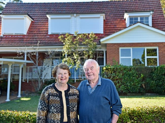 MANLY DAILY/AAP. Ian & Janine Prior outside their home at Frenchs Forest on Thursday, June 20. They are living in Frenchs Forest development hotspot and have decided to sell up after almost 60 years. Holland Crescent adjoins Forest High which will become the new town centre, and developers were chasing this address but as the government has dragged out the rezoning residents are getting impatient. (AAP IMAGE / Troy Snook)