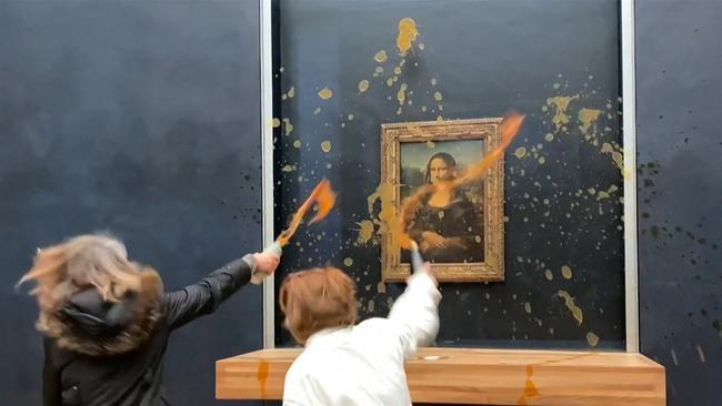 Two environmental activists from the collective dubbed "Riposte Alimentaire" (Food Retaliation) hurled soup at Leonardo da Vinci's "Mona Lisa" painting, at the Louvre museum in Paris, on January 28, 2024. Picture: AFP