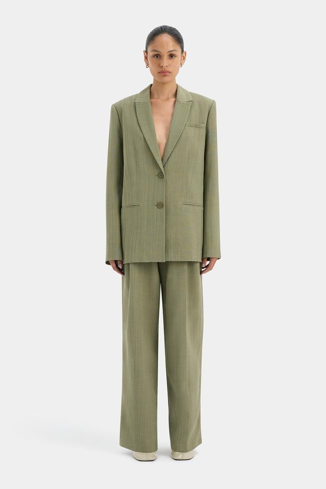 Sir.Evanthe BlazerYes, you can rock tailoring to the office in summer. Case in point: an elegantly colourful, relaxed silhouetted blazer. This olive piece from Sir. is your answer to summer suiting. Type: Blazer | Material: Viscose, polyester | Colour: Olive | Delivery: Free over $300Shop now for $590How can I dress for work in the summer?Dressing for work during summer can certainly prove a challenge, but it can also be fun and relatively simple—you just have to consider a few things first. Where you can, opt for lightweight, breathable fabrics like linen and cotton to keep cool. Tailored shorts or lightweight trousers paired with a fresh blouse or a structured blazer can give you a polished vibe without overheating. Midi skirts are also a solid choice—cute, but still professional. And don’t forget to accessorise! A pair of stylish sandals or flats, and some simple jewellery can really pull your look together while keeping it chill. Lighter colours are great too, helping you feel fresh and cool all day long.What is not appropriate to wear in an office in summer?The answer to this question all comes down to where you work. If you’re in a creative industry perhaps, with more laid-back office rules, casual, beach-worthy attire might be perfectly acceptable. For majority of corporate-style offices however, while summer lets you mix it up a bit, there are probably still some no-gos. Open toe shoes, super short shorts, and tank tops (unless you layer with something) often don’t cut it in the boardroom. Save the jeans and beachy outfits for the weekend, and instead opt for lightweight blouses and pants, midi skirts and slouchy blazers.Can you wear a summer dress to work?Definitely! A summer dress can be a great option for the office, so long as it has a polished silhouette and look. A belted waist adds a nice touch, and throwing on a blazer can elevate your look for meetings or client chats. Just make sure to avoid anything too casual. With the right accessories—think kitten heels or chic flats—your summer dress can easily take you from the office to off-duty.Sign up to our newsletter