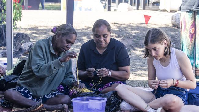 BARUNGA, AUSTRALIA - NewsWire Photos - JUNE 08, 2024: Perpetua Jimarin , Fiona Anderson and weaving pupil Kathryn MCarty from Wyoming USA as the annual Barunga Festival, 375 km south of Darwin as the community of Barunga opens its doors to the world in a celebration of Culture, Sport and Art Picture: NewsWire / Glenn Campbell