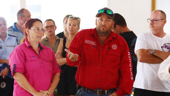 Upset Jimboomba locals voice their concerns to Deputy Premier Cameron Dick at the Jimboomba Community Hall where residents are still without power following the Christmas Day storms. Picture: Lachie Millard