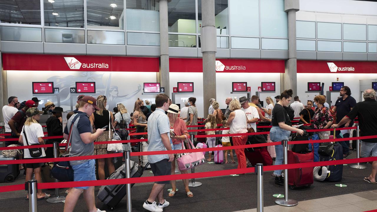 A packed check-in at Virgin Australia at Brisbane Domestic Airport, Brisbane, but when will this scene be repeated in the international terminal? (News Corp/Attila Csaszar)