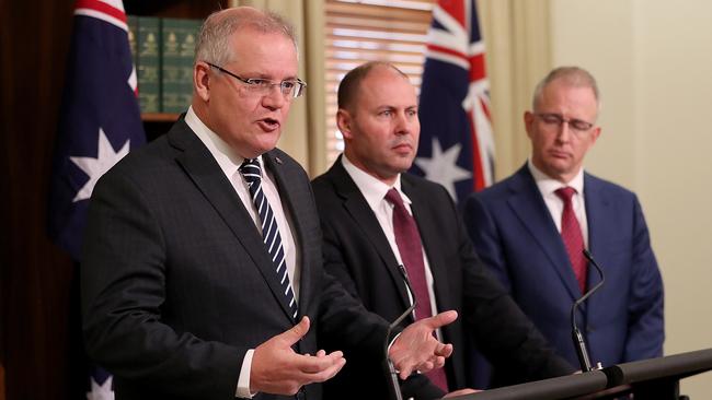 Prime Minister Scott Morrison, Treasurer Josh Frydenberg and Communications Minister Paul Fletcher. Picture: David Geraghty