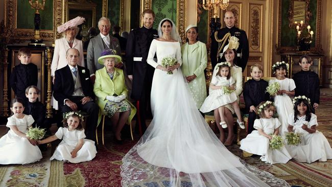 A group shot taken in the Green Drawing Room of Windsor Castle. With Prince Harry and the Duchess are, from left, back row, Jasper Dyer, Camilla, Duchess of Cornwall, Prince Charles, Doria Ragland, Prince William; centre row, Brian Mulroney, Prince Philip, Queen Elizabeth II, Kate, Duchess of Cambridge, Princess Charlotte, Prince George, Rylan Litt, John Mulroney; front row, Ivy Mulroney, Florence van Cutsem, Zalie Warren, Remi Litt. Picture: Alexi Lubomirski