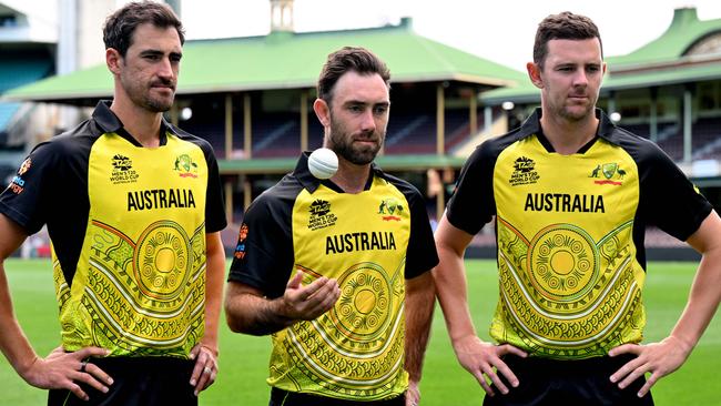 Mitchell Starc, Josh Hazlewood and Glenn Maxwell with new First Nations kit. Picture: Saeed Khan / AFP