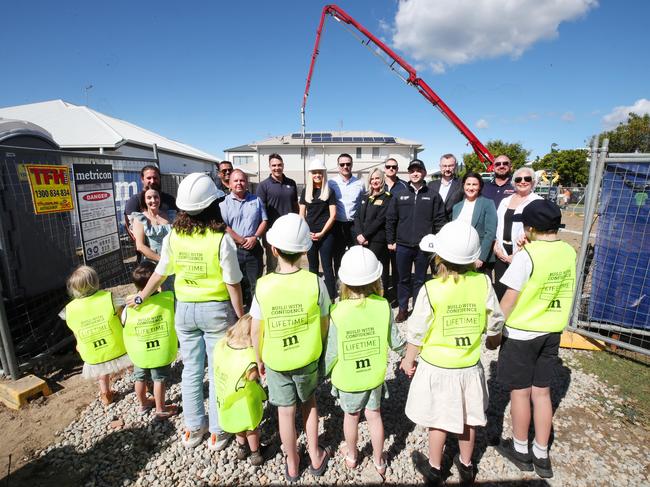 The Wilkinson children with sponsors who are donating towards the construction of their new house. Picture: Glenn Hampson.