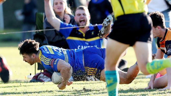 Ben Neville crossing for another of Toukley’s tries. Picture: Sue Graham