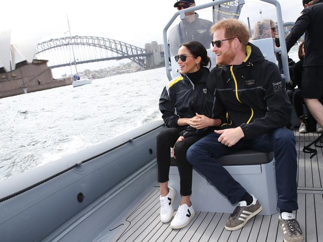 Prince Harry, Duke of Sussex and Meghan, Duchess of Sussex on Sydney Harbour during day two of the Invictus Games in Sydney in 2018. Picture: Getty