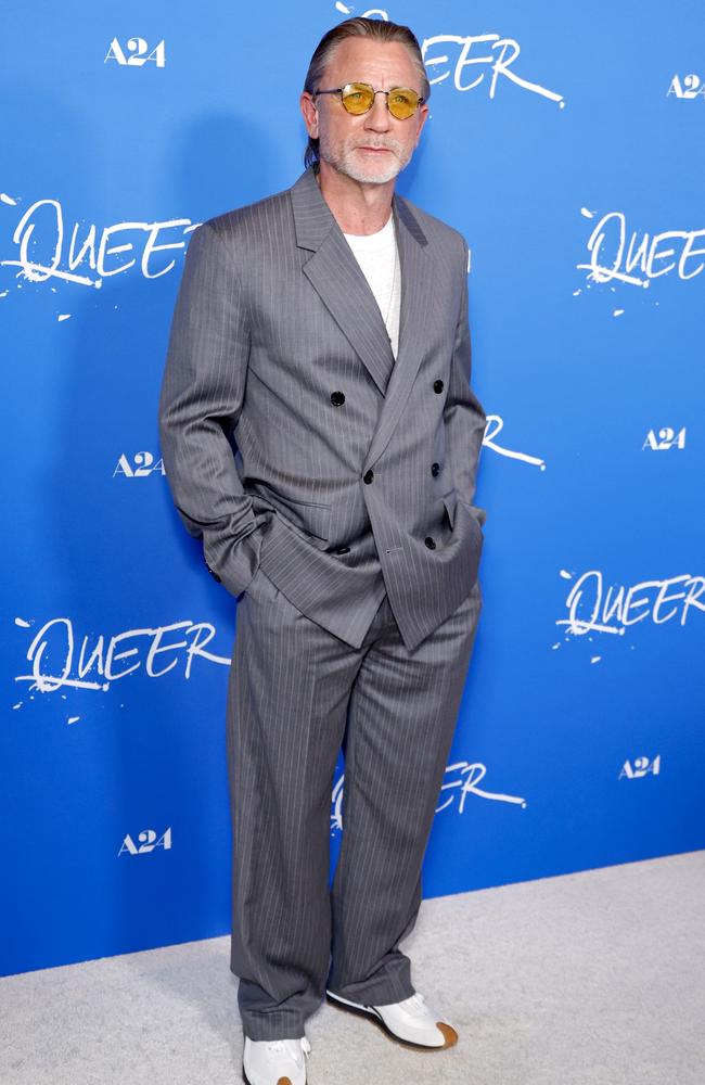 British actor Daniel Craig sports a new sleek look in a grey double breasted suit at the premiere of his latest film ‘Queer’. Picture: Frazer Harrison/Getty Images