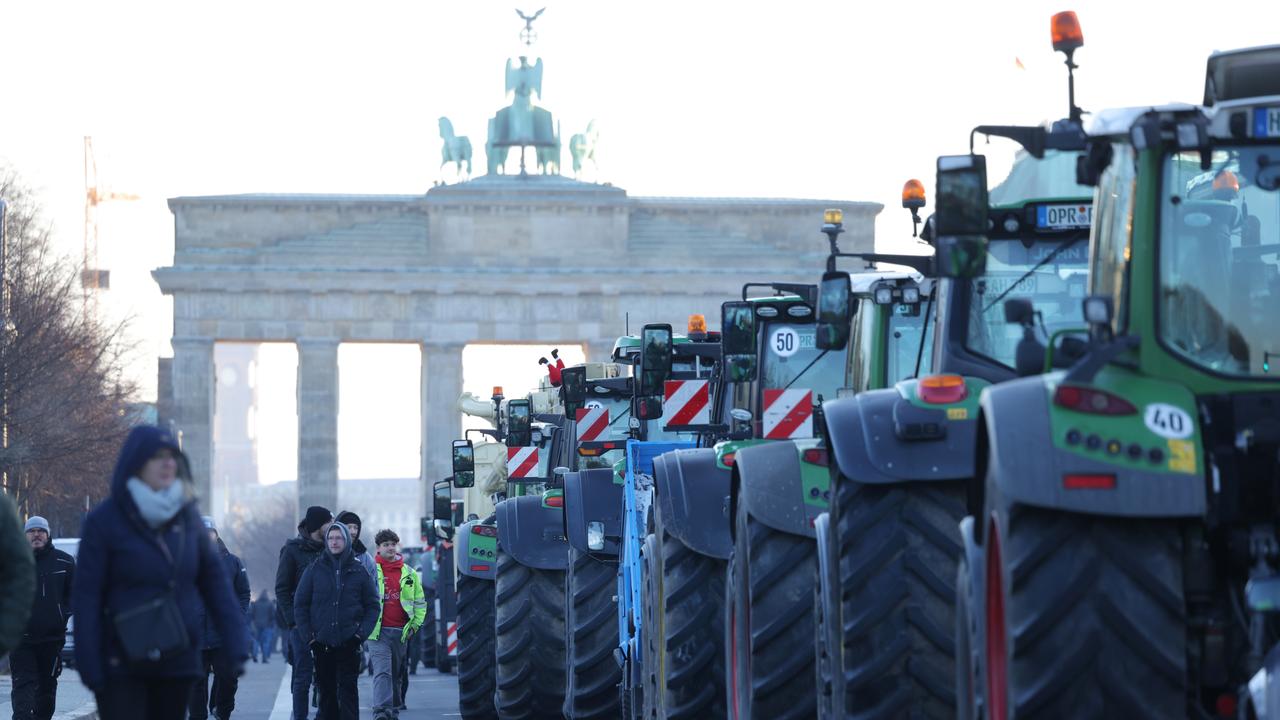 Tractors blockade roads around the Brandenburg Gate, one of the most iconic sights in Berlin, on January 8. Picture: Sean Gallup/Getty Images.