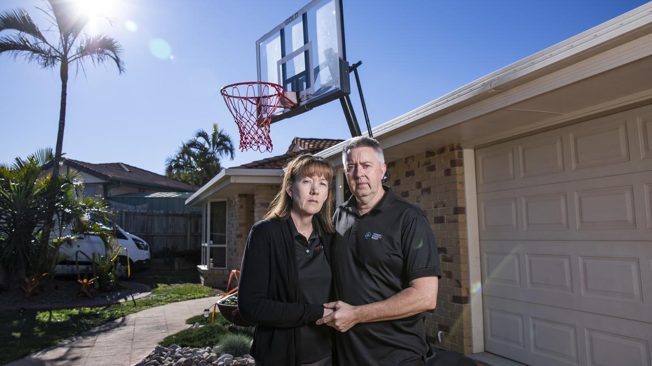 Peter and Fiona Waterson lost their son Jonah to suicide this year. Jonah's basketball hoop is in the background. Picture: Mark Cranitch