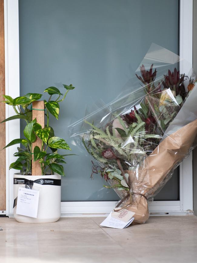 Flowers left in front of Melissa Caddick’s Dover Heights home on Tuesday. Picture: NCA NewsWire / James Gourley