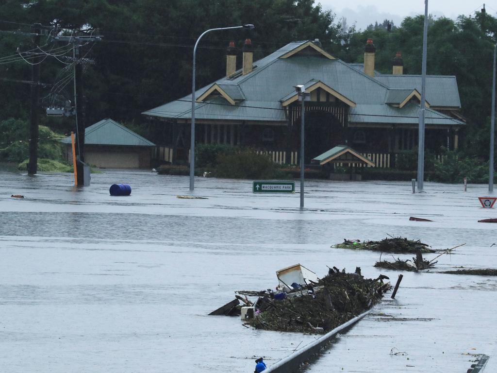 The Hawkesbury River floods the Windsor Bridge. Picture: John Feder