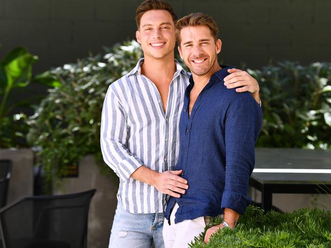 Hugh Sheridan with his partner  Kurt Roberts who were engaged last night pose in their North Adelaide hotel .Saturday March,6,2021.Picture Mark Brake