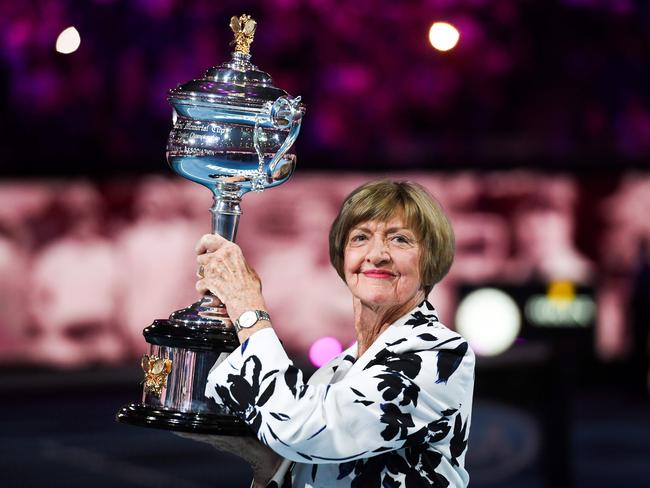 Former Australian tennis player Margaret Court poses with the trophy before the start of men's singles match between Spain's Rafael Nadal and Australia's Nick Kyrgios on day eight of the Australian Open tennis tournament in Melbourne on January 27, 2020. (Photo by William WEST / AFP) / IMAGE RESTRICTED TO EDITORIAL USE - STRICTLY NO COMMERCIAL USE