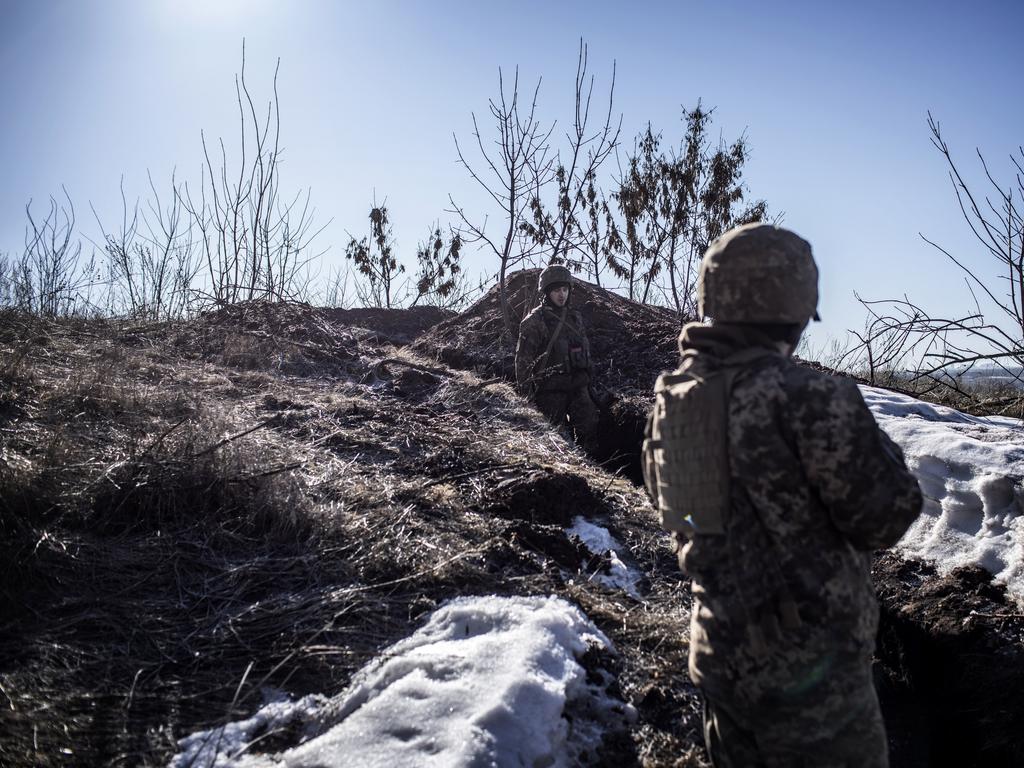 A Ukrainian servicemen stands in a trench at his Unit's position at the contact line near the village of Svitlodarsk, in Donestsk region on February 13, 2022. Picture: Manu Brabo/Getty Images