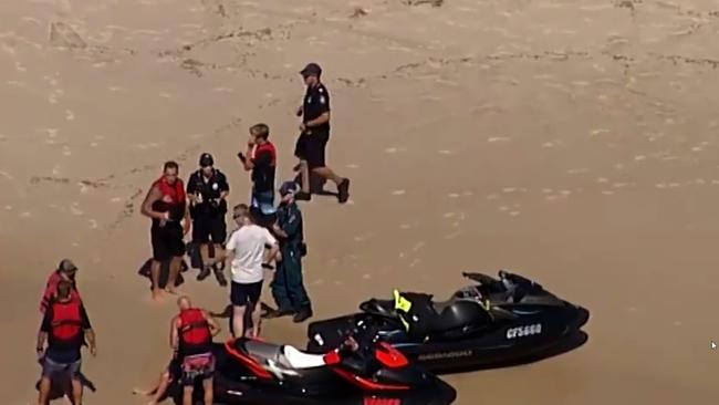 Friends and members of the public rushed to help. Photo: 7 News 