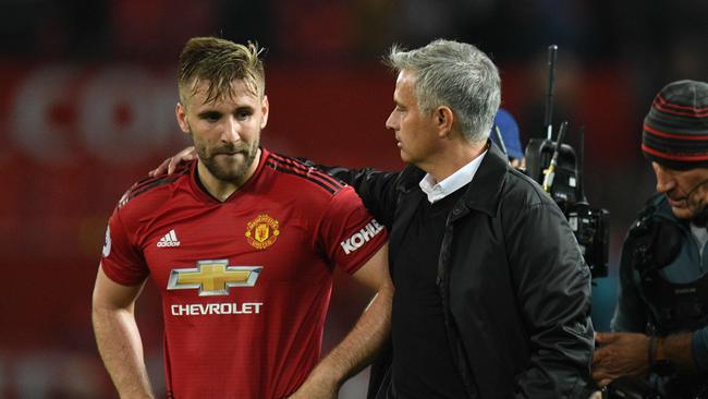 Manchester United defender Luke Shaw is consoled by manager Jose Mourinho after their team’s devastating 3-0 loss to Tottenham at Old Trafford. Photo: AFP
